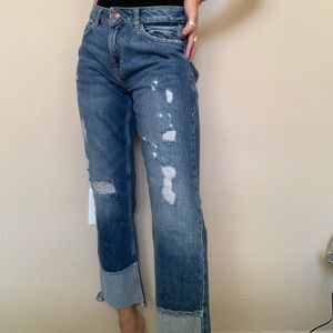 Mid rise straight leg distressed jeans